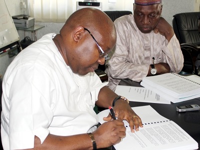 (L-r): Mr. George Uriesi, out-going managing director and Engineer Saleh Dunoma, in-coming, managing director and chief executive officer, Federal Airport Authority of Nigeria (FAAN) during the official hand-over.